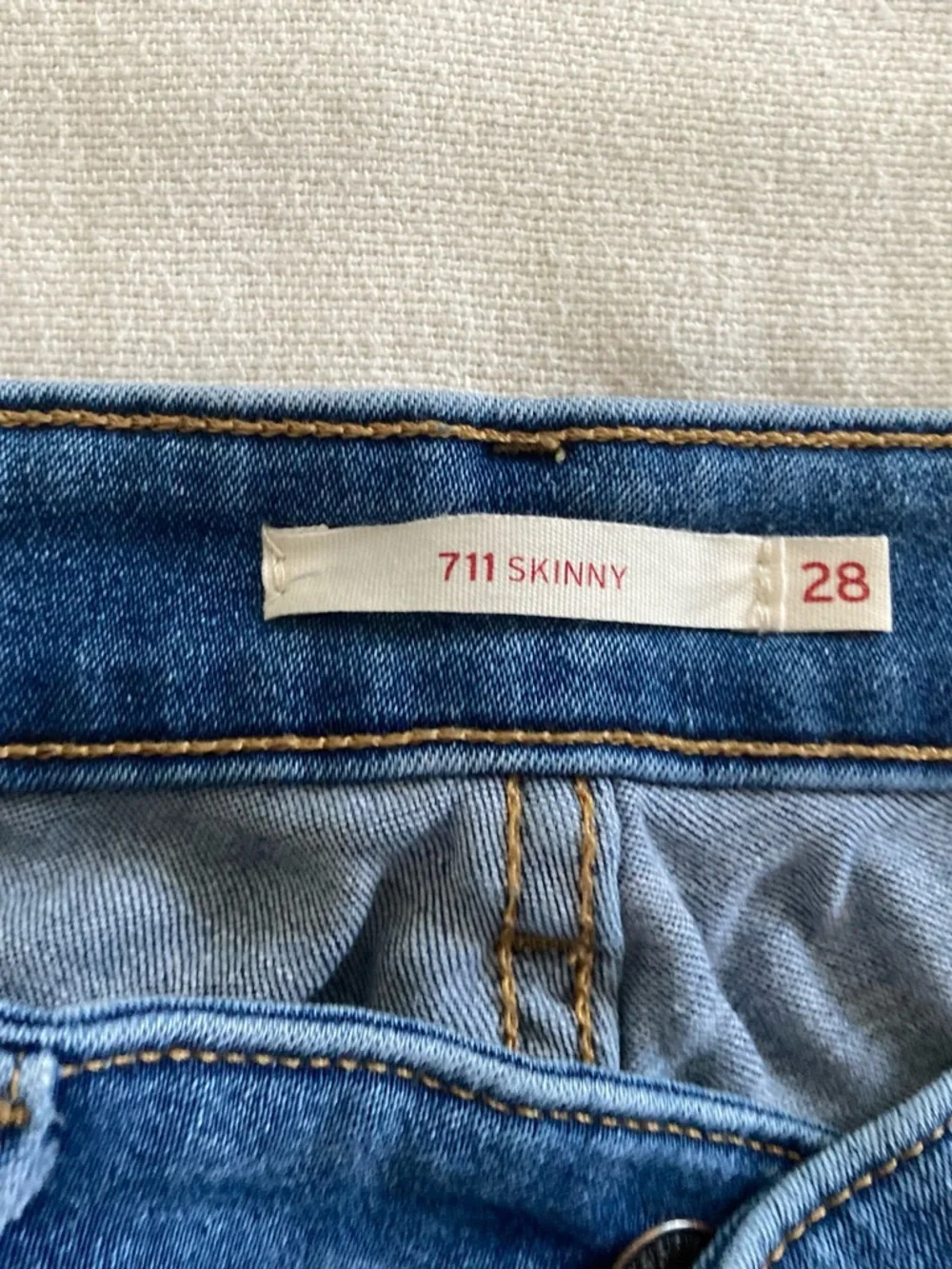 Levi's Blue Cropped Jeans with White Crochet Appliqués and Fringe - Picture 5 of 6